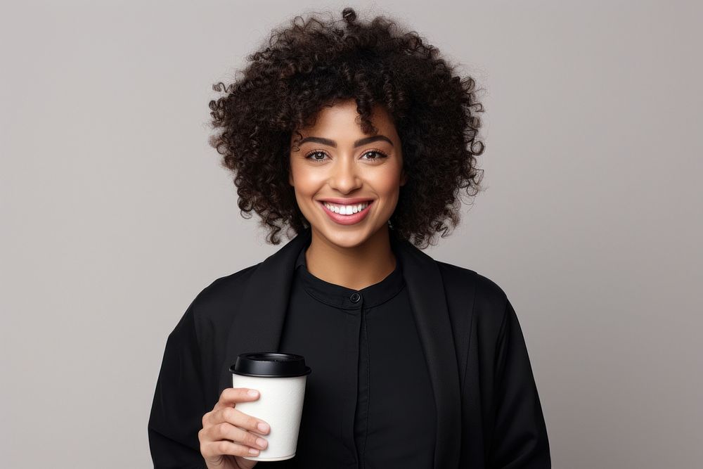 Woman black holding a coffee portrait smile photo. AI generated Image by rawpixel.