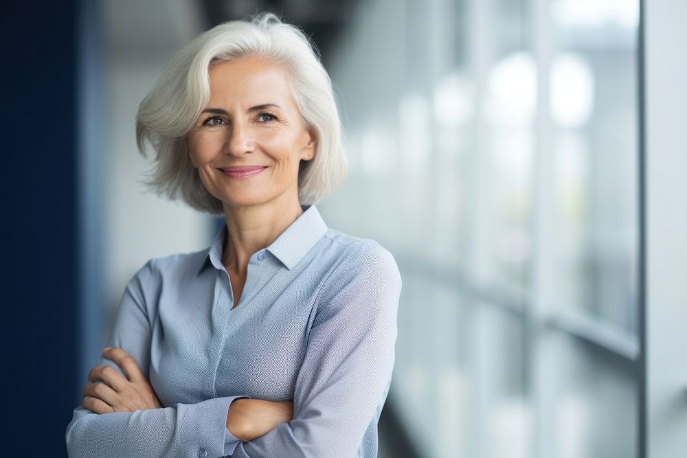 Happy mature woman business portrait smiling adult. AI generated Image by rawpixel.