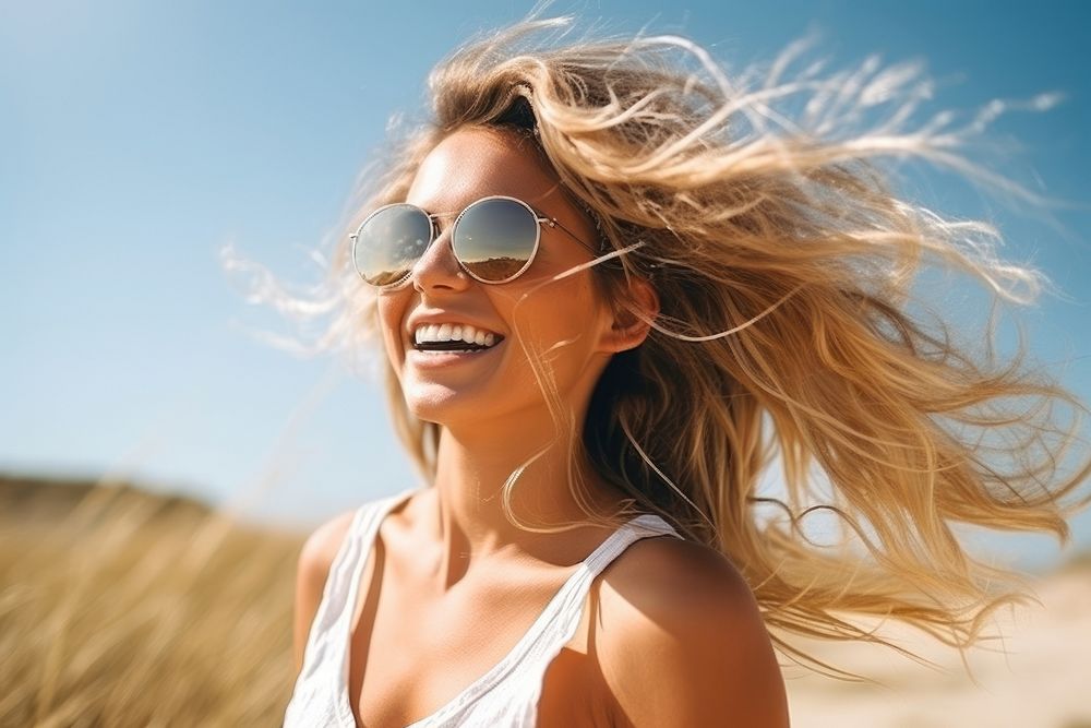 Smiling young woman wearing sunglasses laughing smiling sunny. AI generated Image by rawpixel.