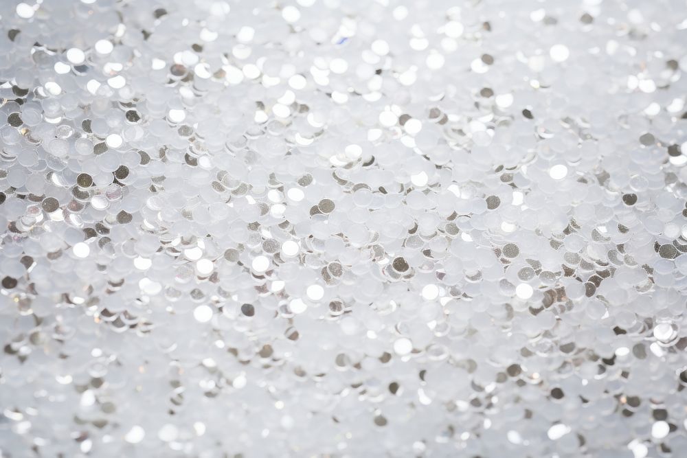 White glitter backgrounds defocused snowflake. AI generated Image by rawpixel.