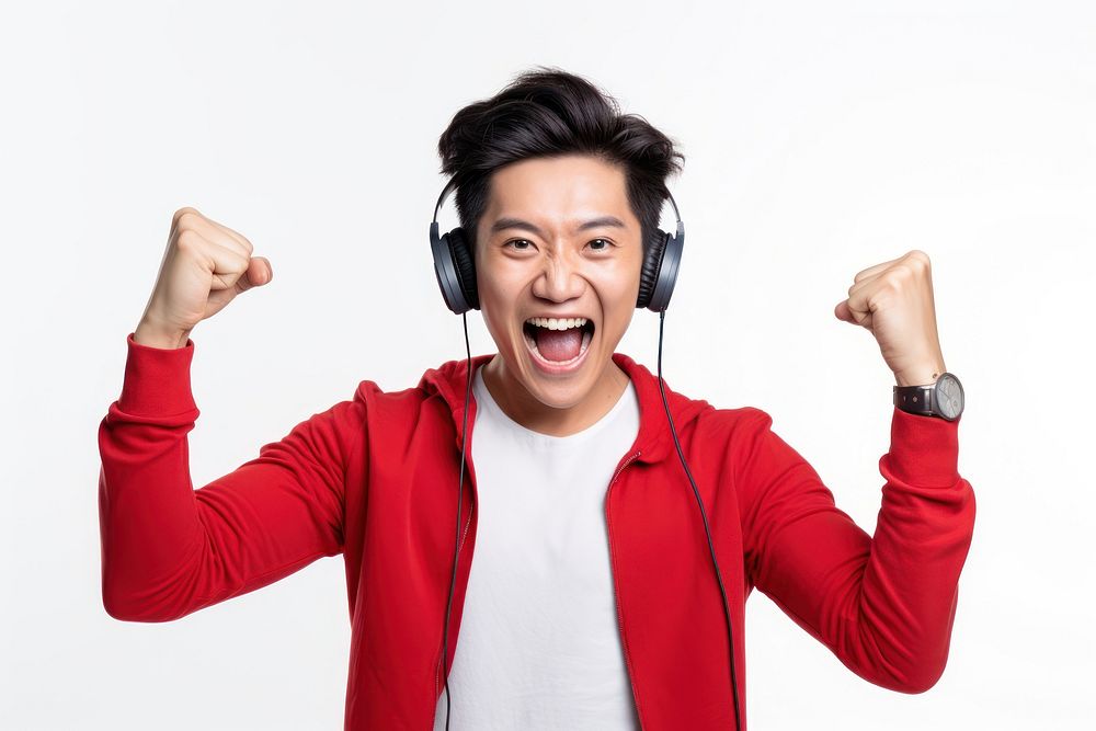 Asian men winning headphones shouting laughing. AI generated Image by rawpixel.