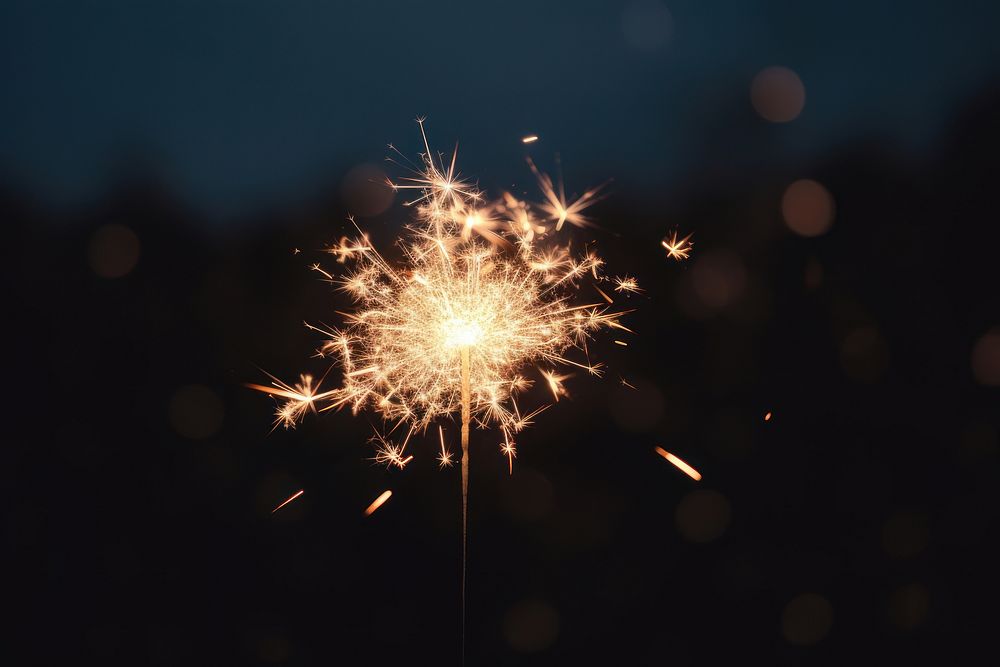 Burning New Year sparkler fireworks outdoors burning. AI generated Image by rawpixel.