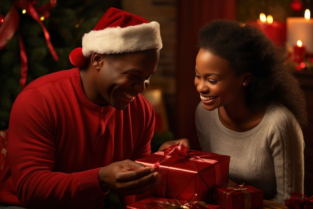 Couple exchanging christmas gifts adult togetherness anticipation. 