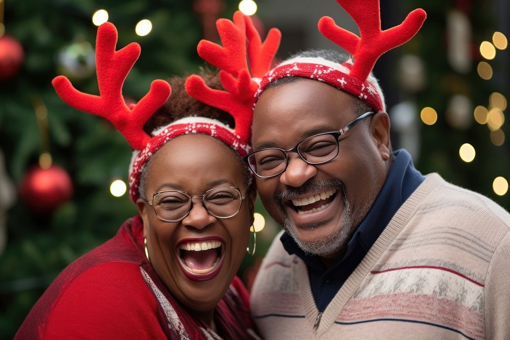 Couple wearing reindeer antlers christmas laughing portrait. AI generated Image by rawpixel.