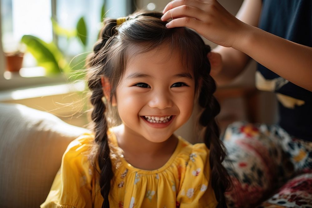 Asian little girl cheerful smiling sitting. AI generated Image by rawpixel.