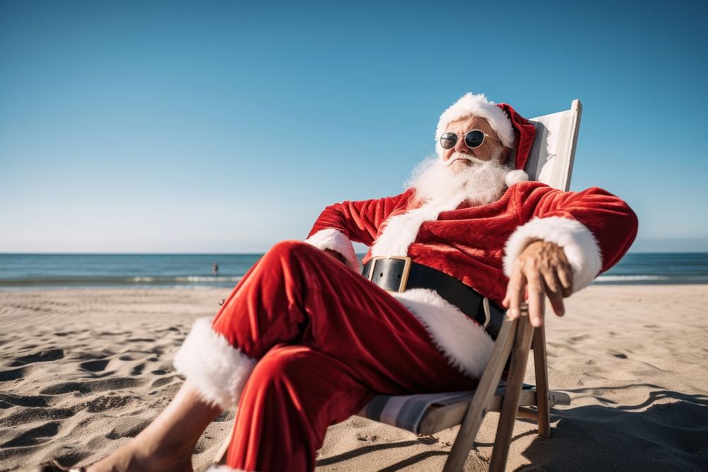 Santa chilling christmas glasses beach