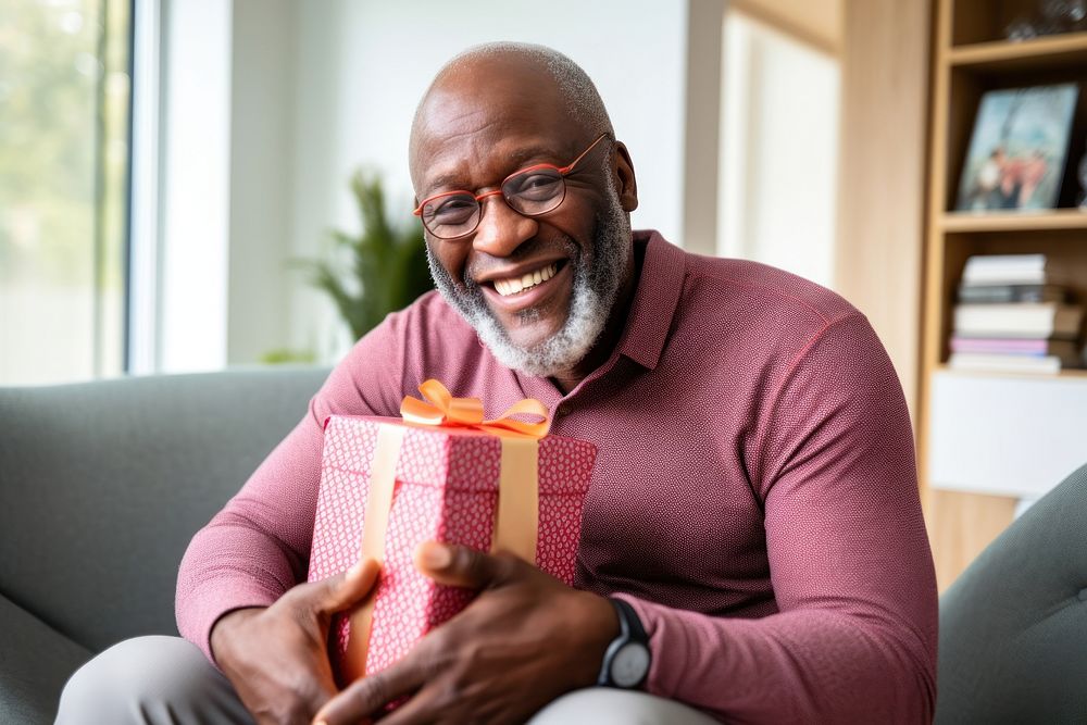 Smiling adult gift man. AI generated Image by rawpixel.