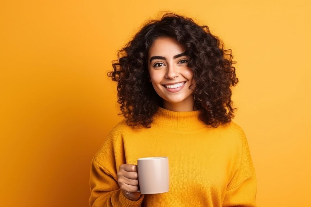 Woman holding a mug yellow smile adult. AI generated Image by rawpixel.