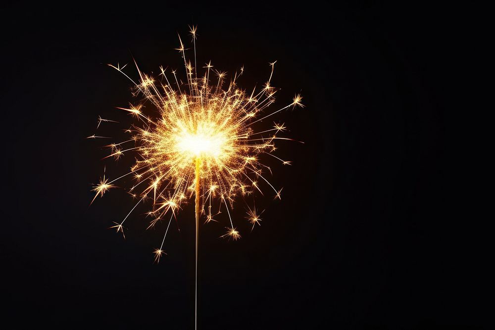 Burning shiny sparkler fireworks outdoors burning. AI generated Image by rawpixel.