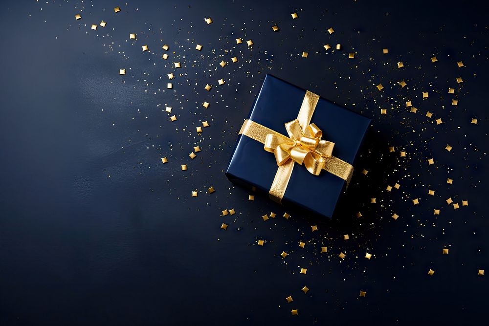 Dark blue gift box ribbon gold illuminated. AI generated Image by rawpixel.