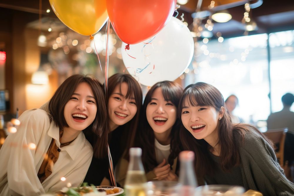 Happy group friends have dinner laughing balloon party. AI generated Image by rawpixel.