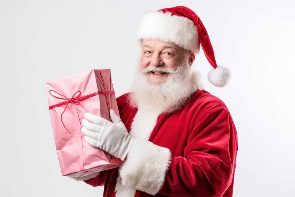 PNG Happy santa claus holding a pink gift paper bag christmas adult celebration. AI generated Image by rawpixel.