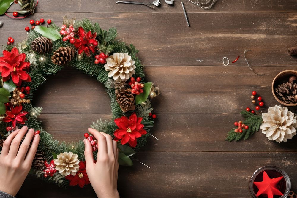 Christmas wreath hand celebration decoration. AI generated Image by rawpixel.