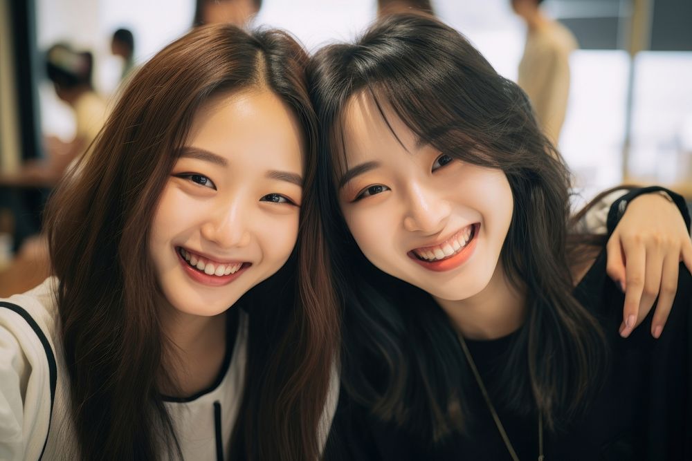 2 asian girls enjoying party laughing selfie smile. AI generated Image by rawpixel.
