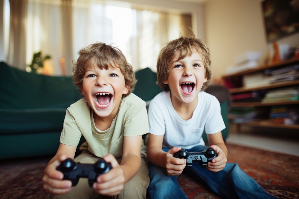 2 boy playing video game child photo togetherness. AI generated Image by rawpixel.