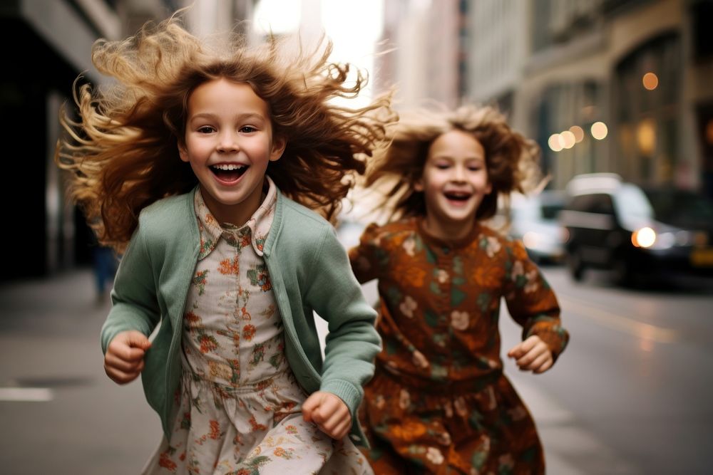 Two young girls running down a busy treet laughing portrait street. AI generated Image by rawpixel.