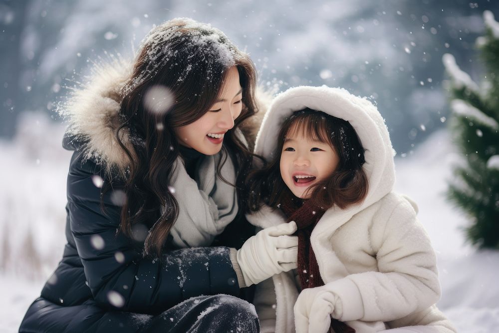 Asian family snow christmas portrait. AI generated Image by rawpixel.