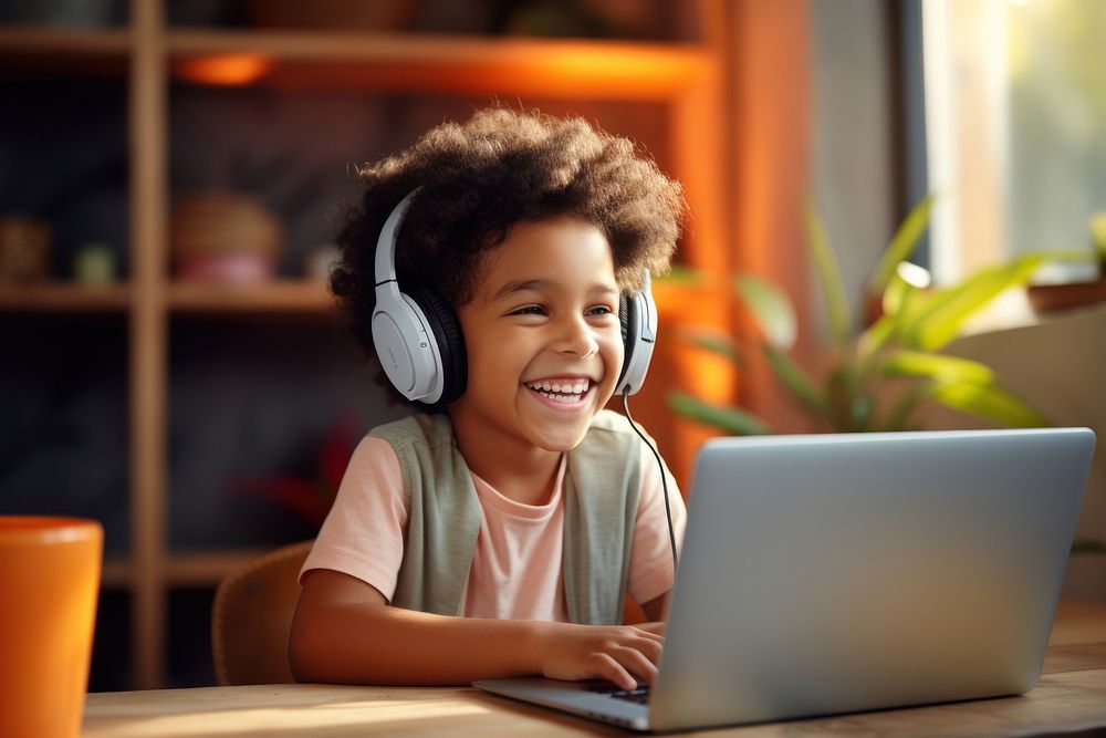 Kid headphones computer laptop. AI generated Image by rawpixel.