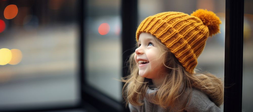 Kid smiling beanie child. AI generated Image by rawpixel.