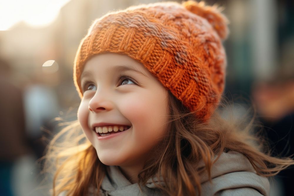 Kid smiling beanie child. AI generated Image by rawpixel.