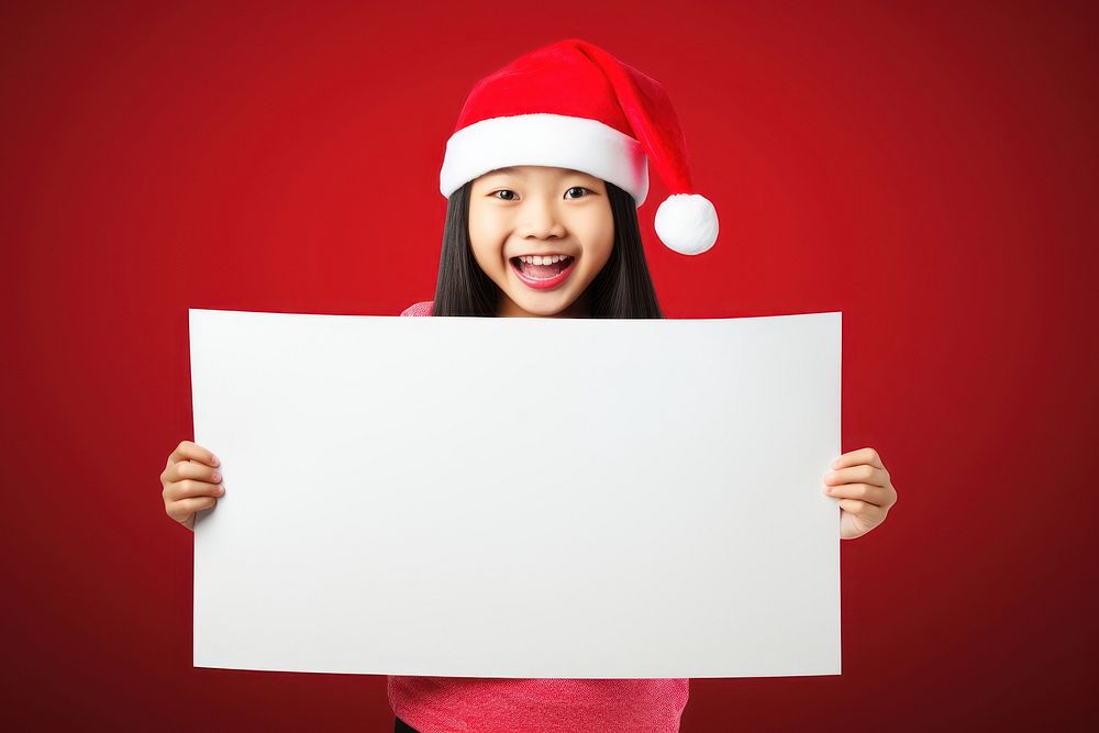 Santa hat portrait holding happy. AI generated Image by rawpixel.