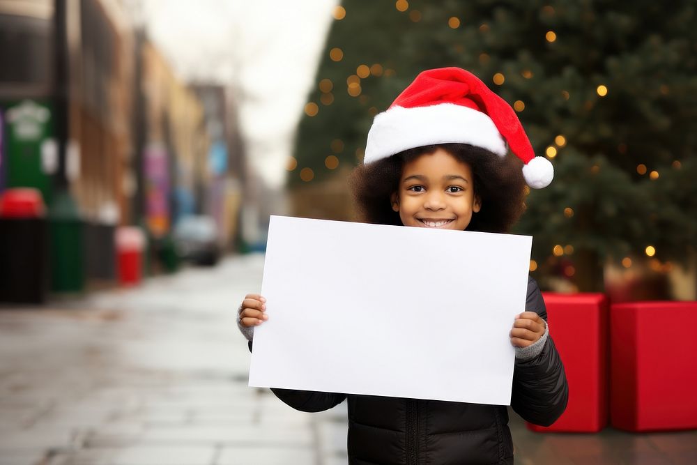 Santa hat holding happy anticipation. AI generated Image by rawpixel.