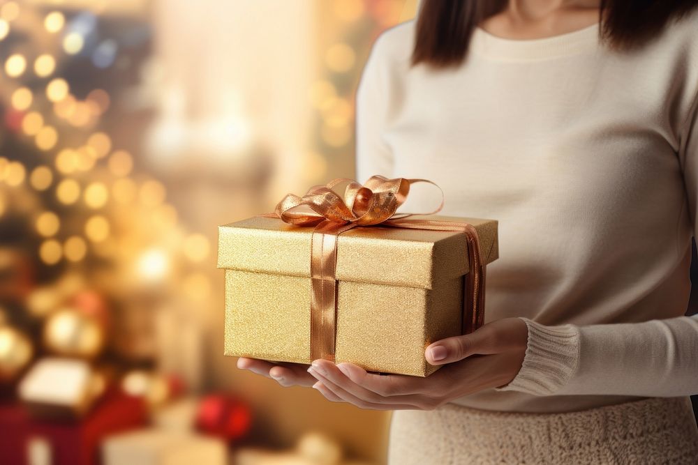 Gift box christmas holding anticipation. AI generated Image by rawpixel.