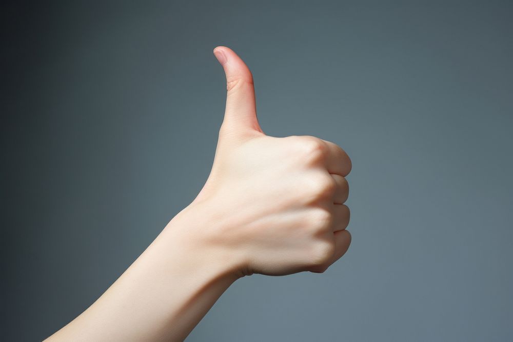 Woman showing thumbs finger adult hand. AI generated Image by rawpixel.