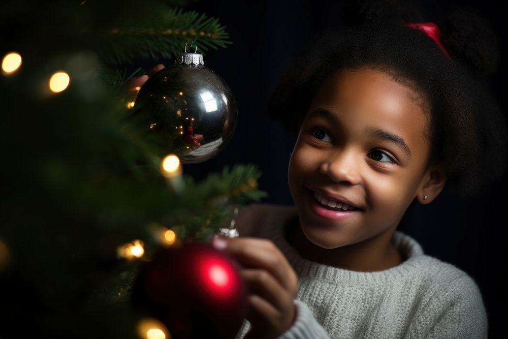 Christmas tree holding child night. AI generated Image by rawpixel.