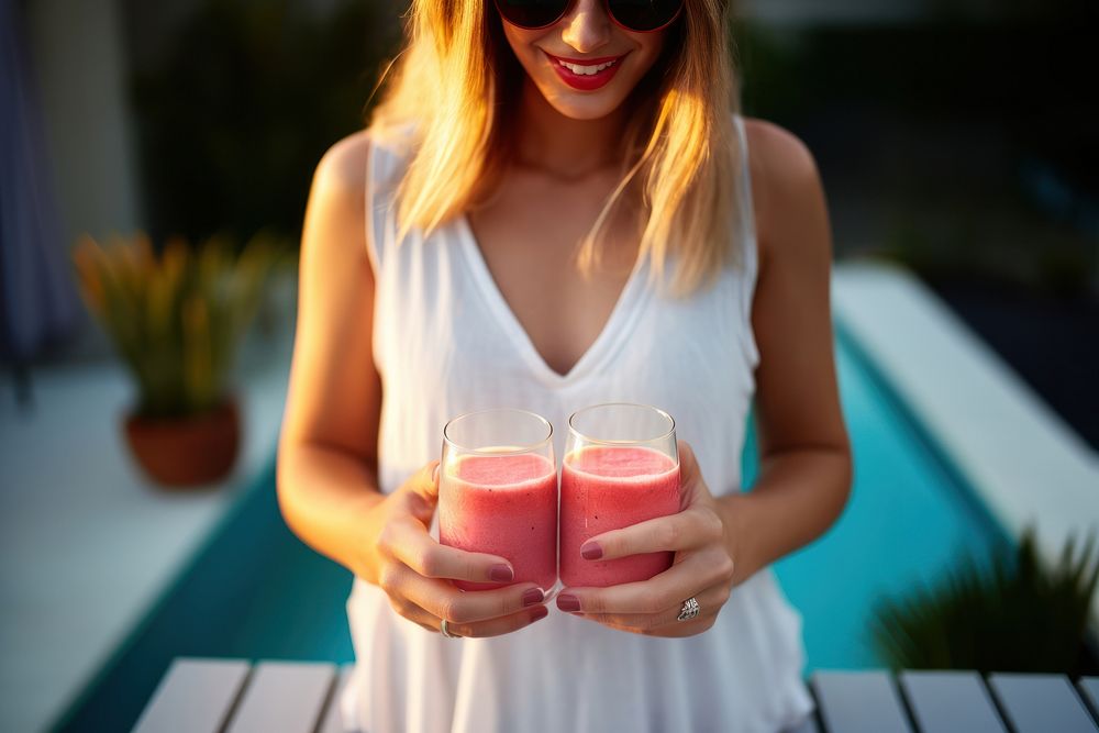 Juice smoothie standing holding. 