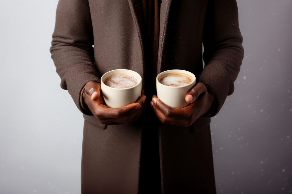 Man holding coffee winter drink coat. AI generated Image by rawpixel.