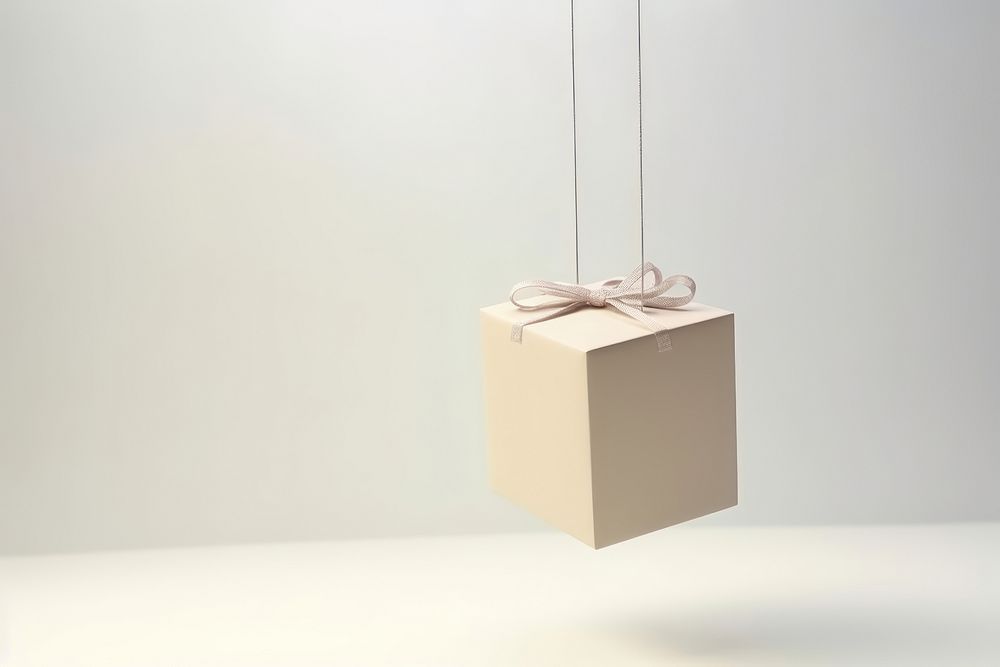Hang puppet blank gift box cardboard anniversary lighting. AI generated Image by rawpixel.