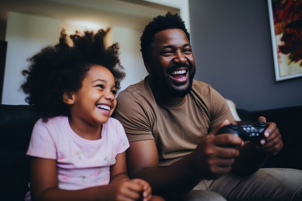 Child dad Gaming laughing. AI generated Image by rawpixel.