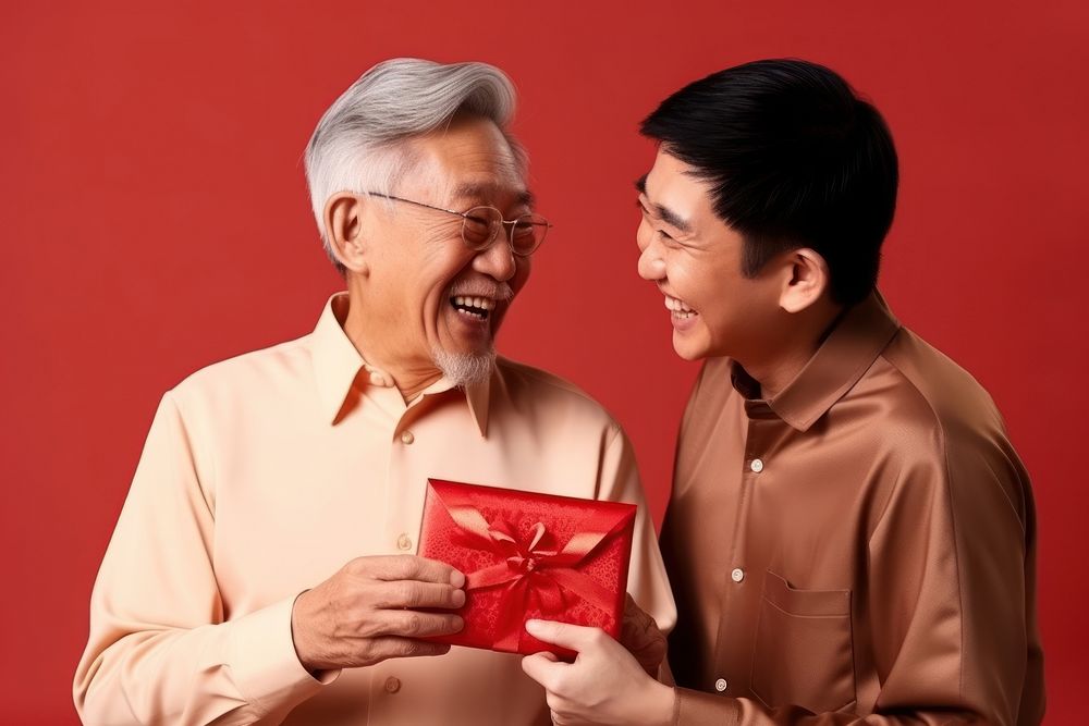 Chinese man glasses family giving. AI generated Image by rawpixel.