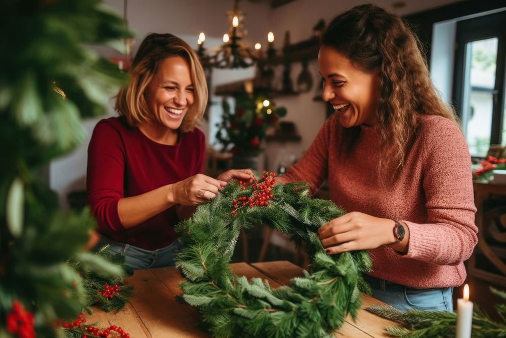 Christmas wreath friends photo laughing. AI generated Image by rawpixel.