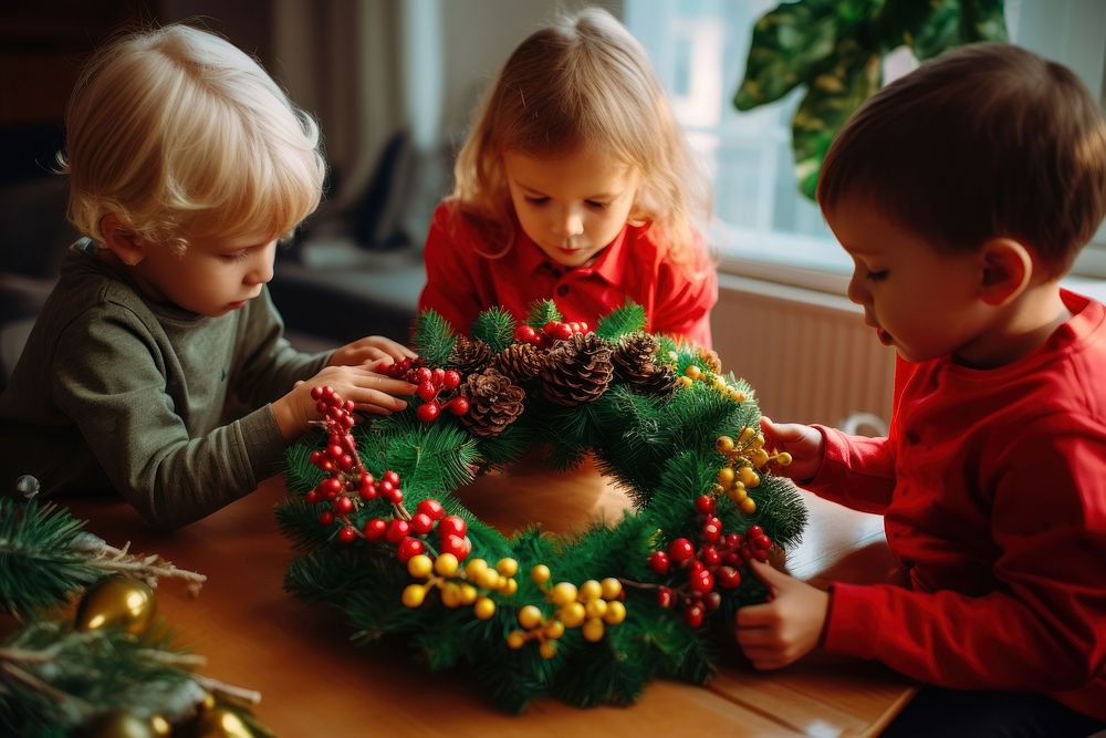 Christmas wreath toddle kids photo table. AI generated Image by rawpixel.