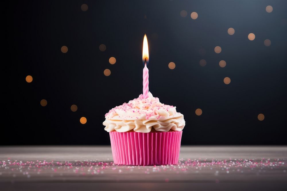 Birthday candle cupcake dessert food. AI generated Image by rawpixel.