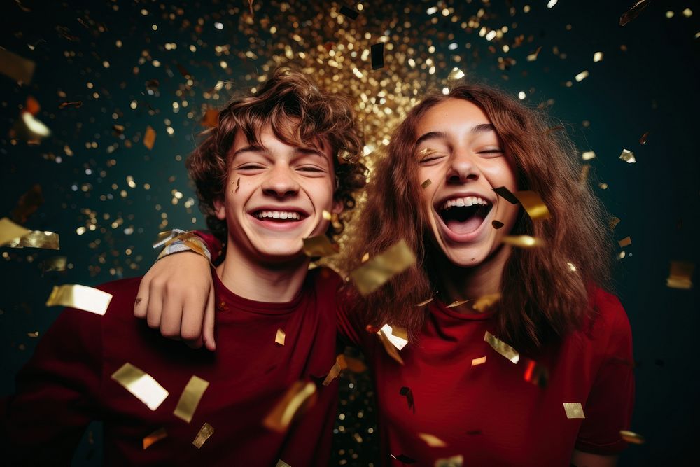 Christmas laughing portrait confetti. AI generated Image by rawpixel.