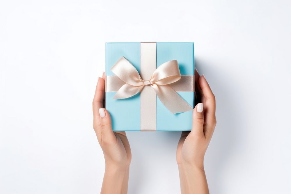 Giftbox holding ribbon paper. AI generated Image by rawpixel.