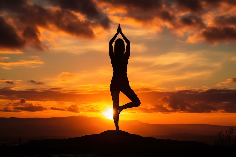 Yoga At Sunset yoga sports sunset. AI generated Image by rawpixel.