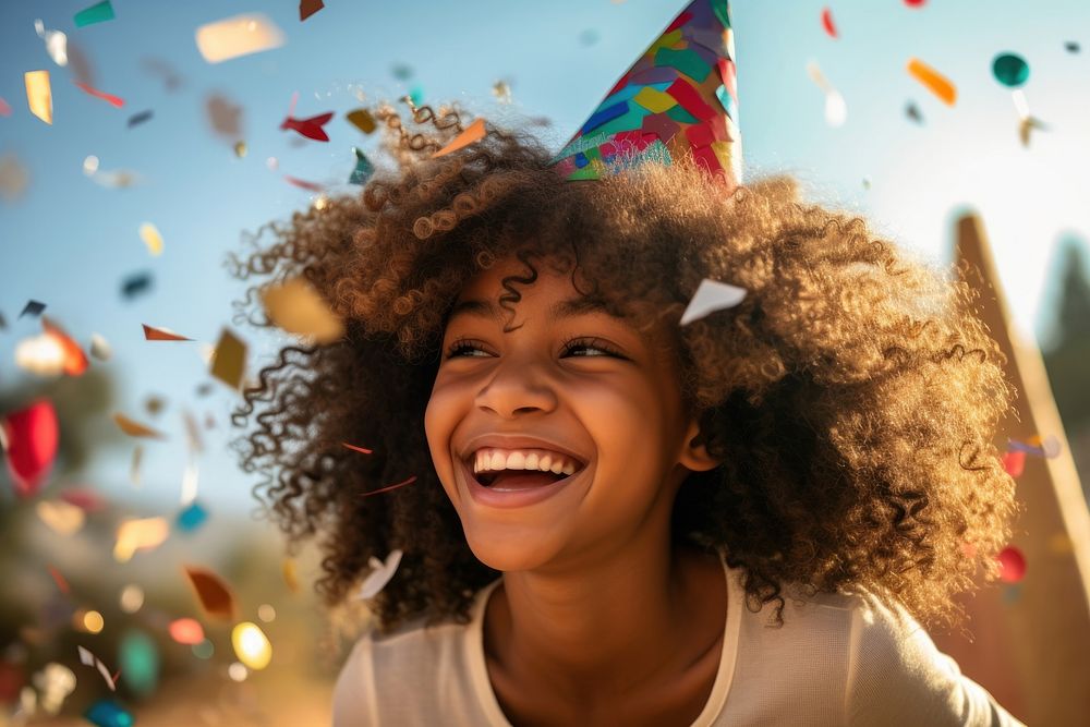 Happy Ethiopian young girl confetti birthday laughing. AI generated Image by rawpixel.