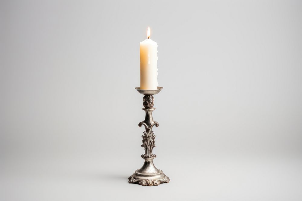 Candle candlestick white background spirituality. AI generated Image by rawpixel.