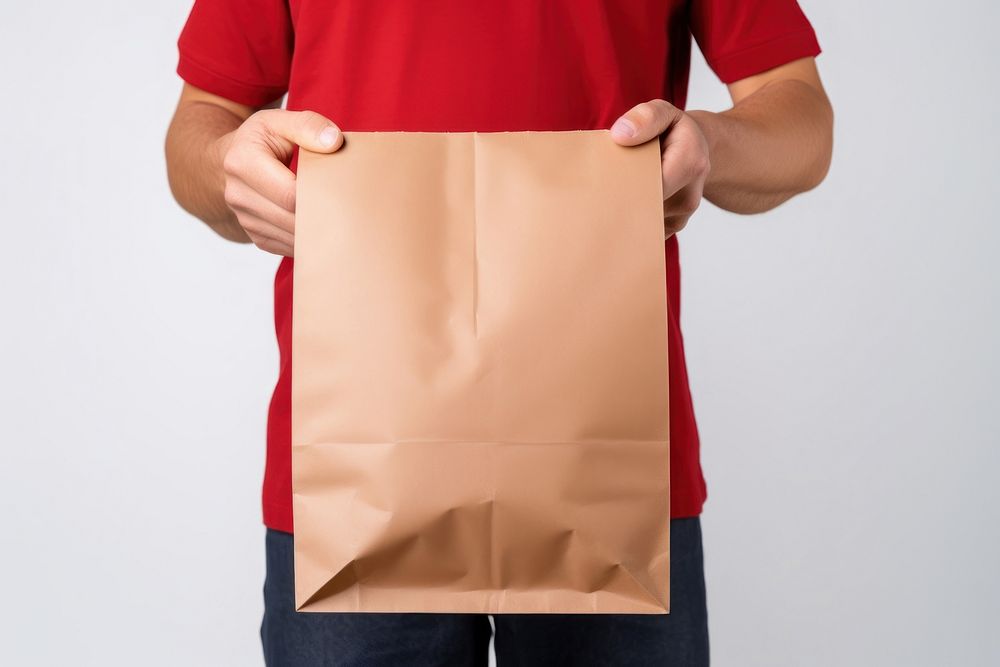 Delivery man employee bag handbag paper. AI generated Image by rawpixel.