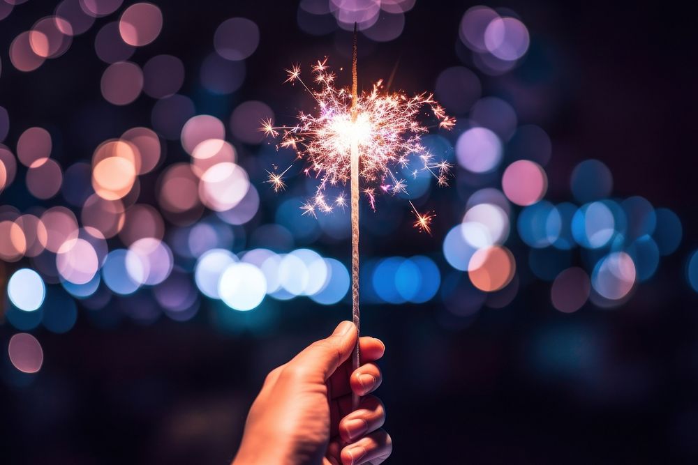 Fireworks holding sparks light. AI generated Image by rawpixel.