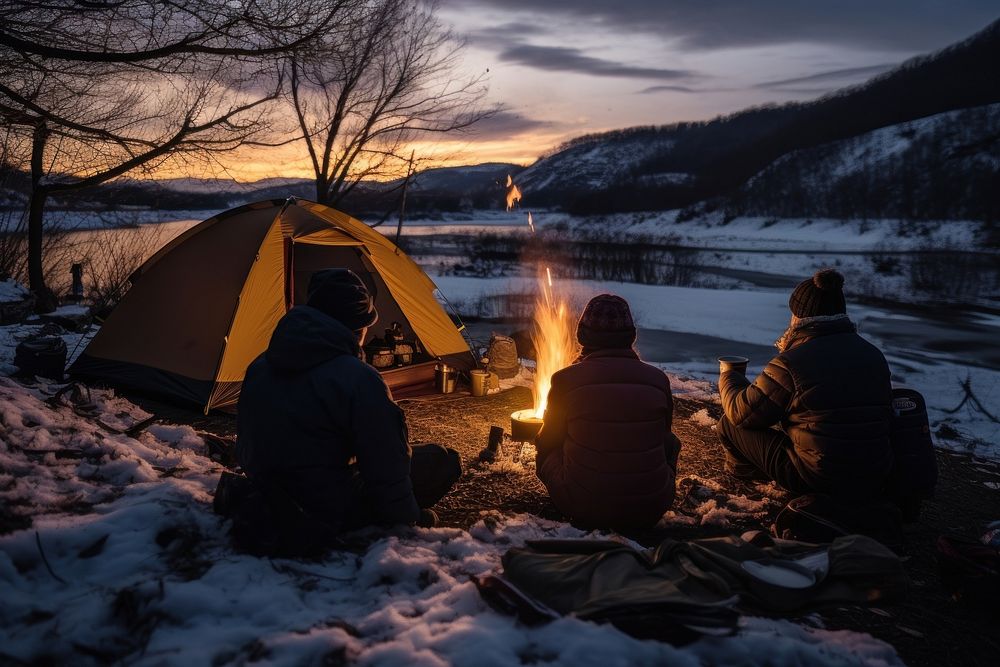 Family camping outdoors bonfire winter. AI generated Image by rawpixel.