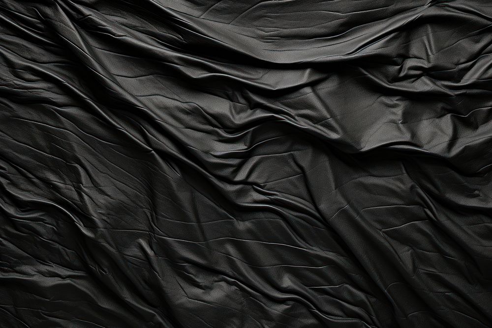 Black wrinkly texture backgrounds monochrome crumpled. AI generated Image by rawpixel.