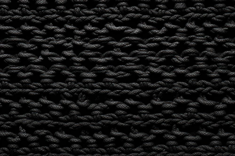 Black Crochet Stitch texture backgrounds repetition monochrome. AI generated Image by rawpixel.