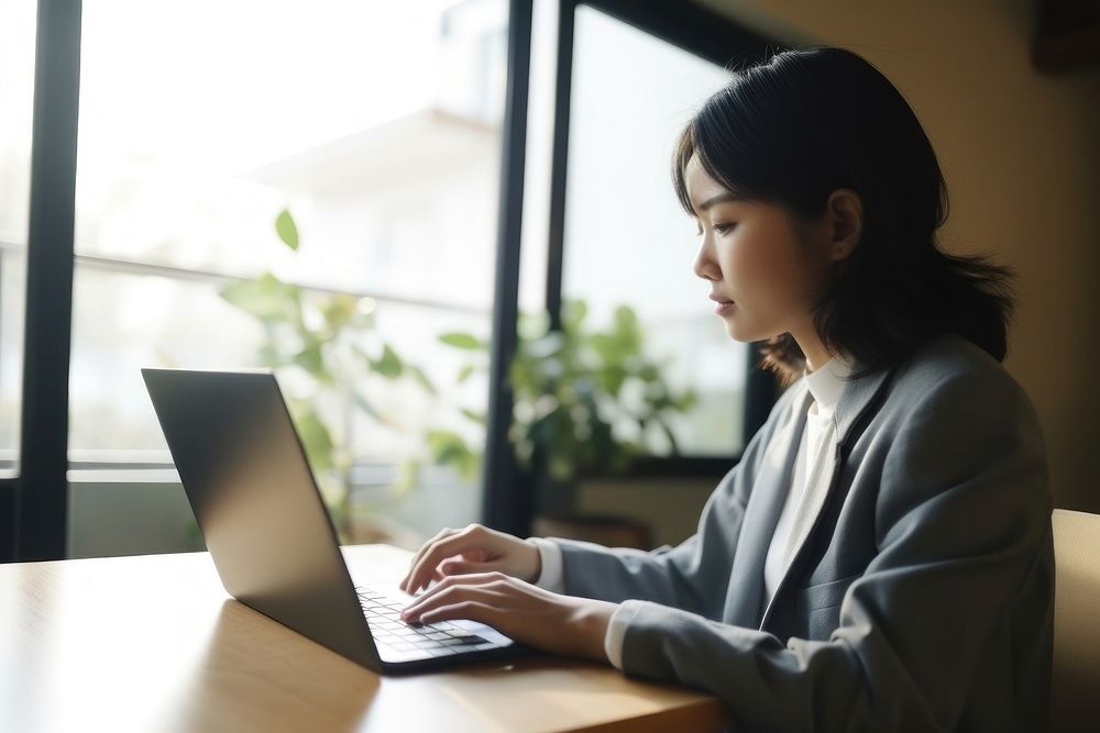 Japanese woman laptop computer adult. AI generated Image by rawpixel.