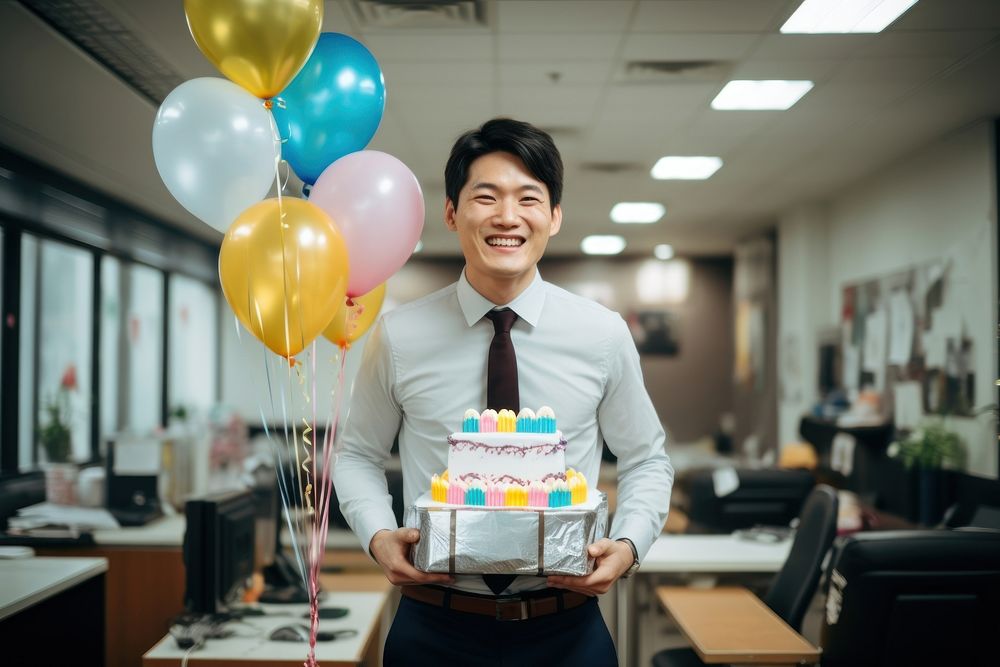 Japanese guy birthday balloon office. AI generated Image by rawpixel.