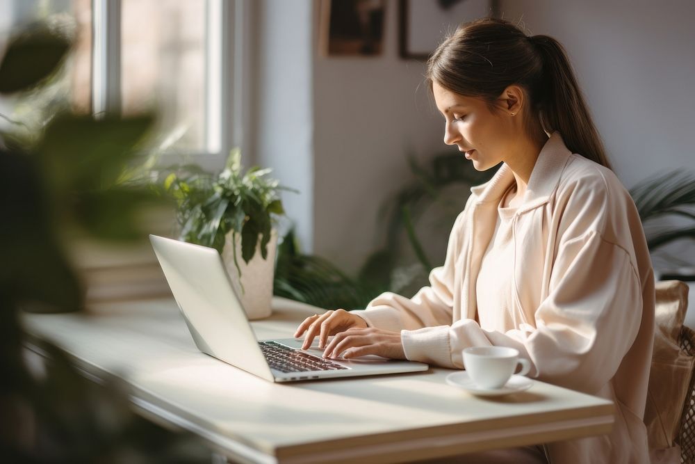 Laptop computer sitting table. | Premium Photo - rawpixel